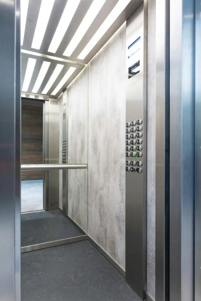 An image of a hospital elevator that requires professional restoration and construction services