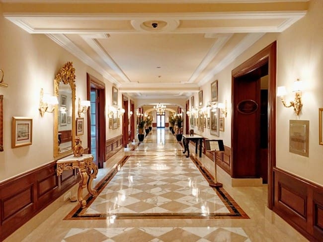 A historic hotel with custom millwork requires detailed architectural finishing and restoration and services