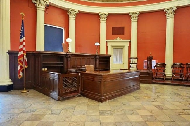 An American courthouse with wooden architecture and fixtures requires careful wood finishing, restoration, and maintenance