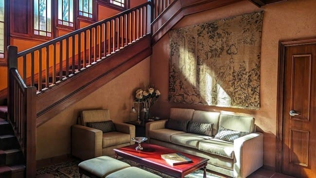 The after image of a newly replaced staircase in a contemporary home, illustrating the sleek design and enhanced safety features