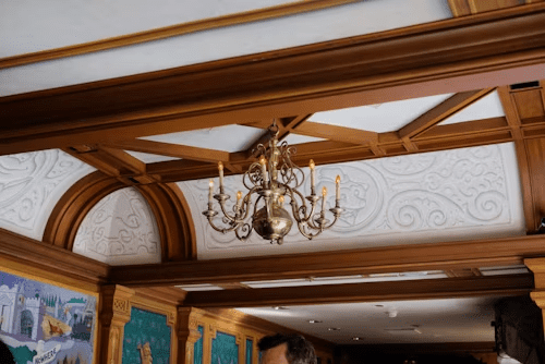 Wood trim used as one of many innovative techniques in architectural finishing for an ornate ceiling.