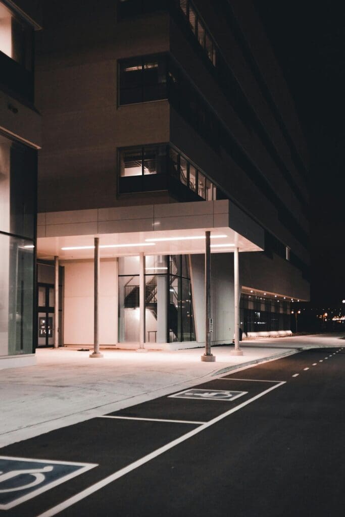 Hospital exterior with metal posts to represent the need for metal restoration and construction services